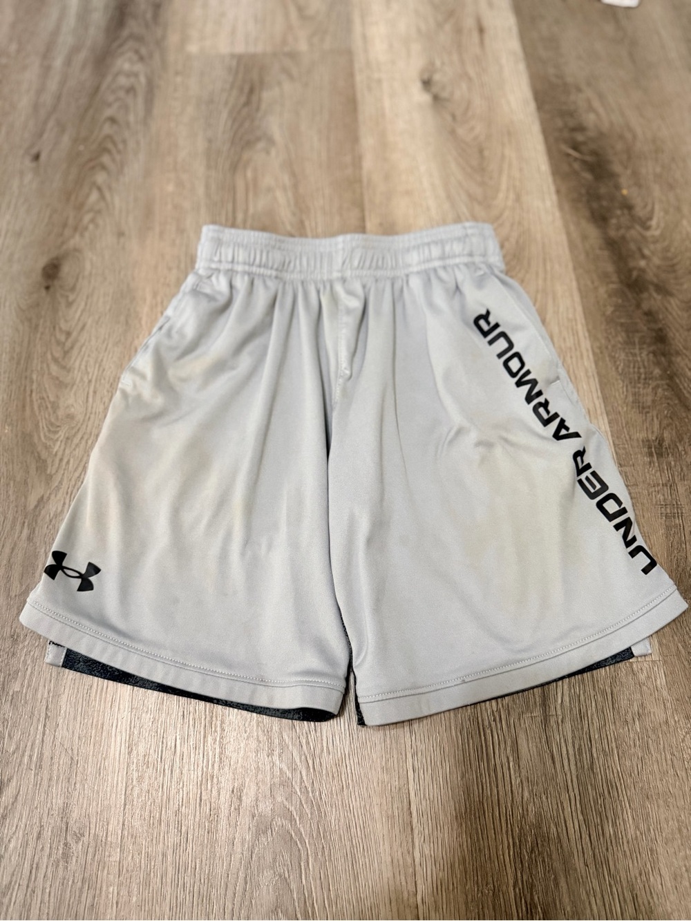 Under Armour Light Gray Kids Athletic Shorts with Black Logo